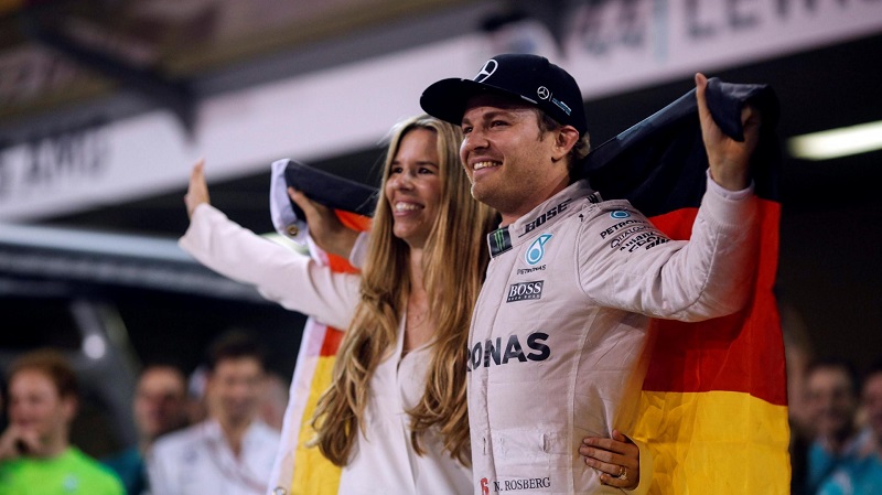 Rosberg slavící titul mistra světa společně se svou ženou Vivian